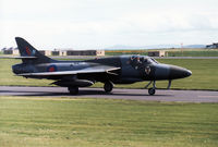 XL568 @ EGQS - Hunter T.7A of 12 Squadron taxying to the active runway at RAF Lossiemouth in May 1990. - by Peter Nicholson