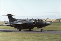 XX885 @ EGQS - Buccaneer S.2B of 12 Squadron taxying to the active runway at RAF Lossiemouth in May 1990. - by Peter Nicholson