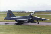 K-3016 @ EGQS - NF-5A of 314 Squadron Royal Netherlands Air Force taxying to the active runway at RAF Lossiemouth in May 1990. - by Peter Nicholson