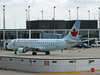 C-FEJC @ KORD - Just in from YYZ, this AC ERJ 175 pulls in at its gate at ORD. - by Daniel L. Berek