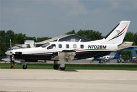 N702BM @ KOSH - KOSH - by Nick Dean