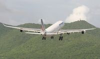 F-GLZP @ TNCM - Air France F-GLZP clearing the hills for France - by Daniel Jef