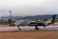 NAF 701 @ EGQS - Jaguar BN of the Nigerian Air Force taxying to the active runway at RAF Lossiemouth in September 1984. - by Peter Nicholson