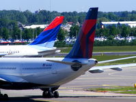 N861NW @ EHAM - Two different Delta Airlines tails - by Chris Hall