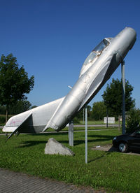 140 @ EDTL - Pole mounted MiG-15 at the entrance of Lahr Airport... - by Shunn311