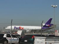 N357FE @ ONT - Another Fed Ex parked behind Airport Police parking and behind Fed Ex building - by Helicopterfriend