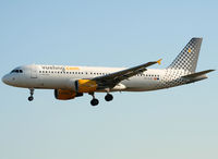 EC-KJD @ LEBL - Landing rwy 25R in Vueling c/s - by Shunn311