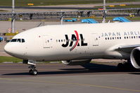 JA704J @ EHAM - Japan Airlines - by Chris Hall