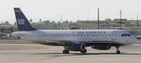 N673AW @ KPHX - Taxing at PHX - by Todd Royer