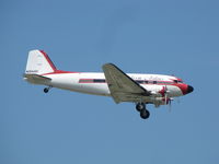 N1944H @ KOSH - Part of mass arrival of DC-3's Oshkosh airshow 2010 - by steveowen