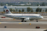 N828AW @ KPHX - US Airways A-319 displaying former America West livery at PHX - by T.P. McManus