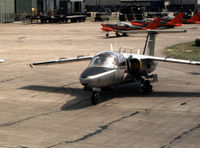 1104 - Saab 105OE of the Austrian Air Force Karo As aerobatic team on the flight-line at the 1981 Intnl Air Tattoo at RAF Greenham Common. - by Peter Nicholson