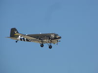 N3239T @ KOSH - landing during the mass Arv EAA2010 airshow - by steveowen