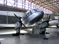 G-AIDL @ EGBE - Air Atlantique Classic Flight DH Rapide inside the hangar at Coventry 'Airbase' - by Chris Hall