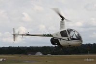 G-LHCA @ EGKR - ROBINSON R22 BETA, c/n: 2947 - by Trevor Toone