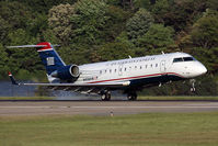 N458AW @ ORF - US Airways Express (Air Wisconsin) N458AW landing RWY 23. - by Dean Heald