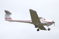 SE-MEL @ ESSF - Diamond DA20-C1 flying over Hultsfred airport in Sweden. - by Henk van Capelle