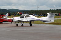 SE-MAE @ ESSF - DA42 taxying on the platform of Hultsfred airport in Sweden. - by Henk van Capelle