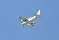 N421TM @ KPSP - WF CONSTRUCTION Cessna 421C Golden Eagle on approach to RWY 31L KPSP. - by Mark Kalfas