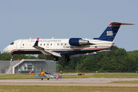 N463AW @ ORF - US Airways Express (Air Wisconsin) N463AW landing RWY 5. - by Dean Heald