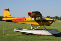 CF-IUB @ CNJ4 - Brightly colored Cessna 185 on floats - by Duncan Kirk