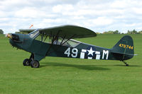 G-BGPD @ EGBK - 1943 Piper PIPER J3C-65, c/n: 10478 wears USAF Serial 479744 at 2010 LAA National Rally at Sywell - by Terry Fletcher