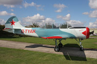 G-TYAK @ EGBR - Bacau Yak-52 at Breighton Airfield's Summer Madness All Comers Fly-In in August 2010. - by Malcolm Clarke