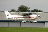 G-SHSP @ EGBK - 1999 Cessna CESSNA 172S, c/n: 172S8079 arriving at the 2010 LAA National Rally - by Terry Fletcher