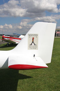 G-RMMT @ EGBR - Europa XS. 'Grommet and the wanted chicken' at Breighton Airfield's Summer Madness All Comers Fly-In in August 2010. - by Malcolm Clarke