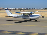 N7561X @ KCCR - Locally-based 1977 Cessna R182 passing public viewing area at Buchanan Field - by Steve Nation