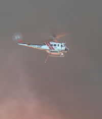 N495DF - Taken at 7:20:42 PM, 9/9/10 above San Bruno, CA, site of massive natural gas pipeline explosion. The undercarriage is lit orange from the light of the intense fire below. - by Bill Pauley