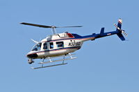 N3218Q @ KDPA - CLAYTON AIRCRAFT Bell 206L-3, N3218Q departing KDPA. - by Mark Kalfas