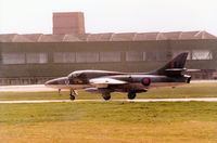 XL568 @ EGQS - Hunter T.7A of 12 Squadron at RAF Lossiemouth returning after a mission in the Summer of 1983. - by Peter Nicholson