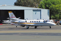 N398LS @ KCCR - Les Schwab Tires 1998 Cessna 550 taxiing to PSA ramp on arrival from KCXP/Carson City, NV (Bill Larkins is lurking in the bushes, camera in hand!) - by Steve Nation