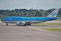 PH-BFH @ EHAM - KLM turning onto the outer t/w for departure - by Robert Kearney