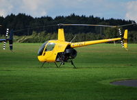 G-TOLY @ EGTB - Robinson R22 Beta at Wycombe Air Park - by moxy