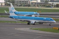 PH-EZF @ EHAM - KLM cityhopper taxiing in after arrival