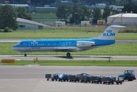 PH-KZH @ EHAM - Yet another KLM cityhopper taxiing for departure - by Robert Kearney