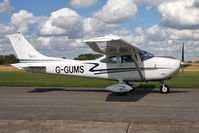 G-GUMS @ EGBR - Cessna 182P at Breighton's Summer Madness & All Comers Fly-In in August 2010. - by Malcolm Clarke