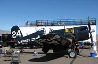 N240CA @ KRTS - Race #24 F4U-4 BuAer 97359 VMFT-20 Marines being worked on pits as NX240CA for Unlimited Class race @ 2009 Reno Air Races - by Steve Nation