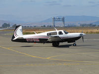 N131RM @ KAPC - Very sharp 1996 Mooney M20M arriving on visitors ramp at Napa County Airport, CA (KAPC) from University Airport, Davis, CA (KEDU) with Napa River RR bridge in background - by Steve Nation