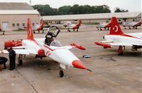 3027 @ EGVA - NF-5A Freedom Fighter of the Turkish Stars aerobatic display team on the flight line at the 1997 Intnl Air Tattoo at RAF Fairford. - by Peter Nicholson