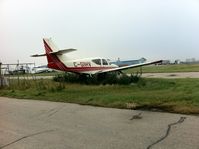 C-GIHV @ CYYC - This is a sad sight and one that I hate.  I dislike watching beautiful aircraft rot.  The interior of this one has already done so and parts are missing.  I wish I had the funds to purchase it from the owner and haul it off to Springbank making it flyable - by awparran