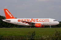 G-EZFZ @ EGCC - easyJet Airbus A-319-111 - by Chris Hall