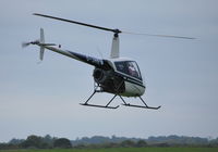 G-JHEW @ EGTB - Robinson R22 Beta departing Wycombe Air Park - by moxy
