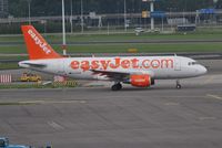 G-EZFM @ EHAM - And another EasyJet taxiing for departure - by Robert Kearney
