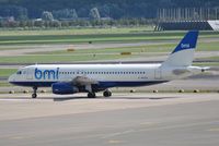 G-MEDK @ EHAM - BMI rolling onto remote stand - by Robert Kearney