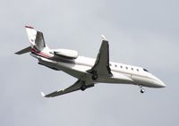 N702QS @ MCO - Net Jets Gulfstream 200 - by Florida Metal