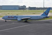 PH-AHX @ EHAM - Arkefly taxiing out for departure - by Robert Kearney