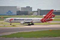 PH-MCP @ EHAM - Martinair Cargo taxiing for departure - by Robert Kearney